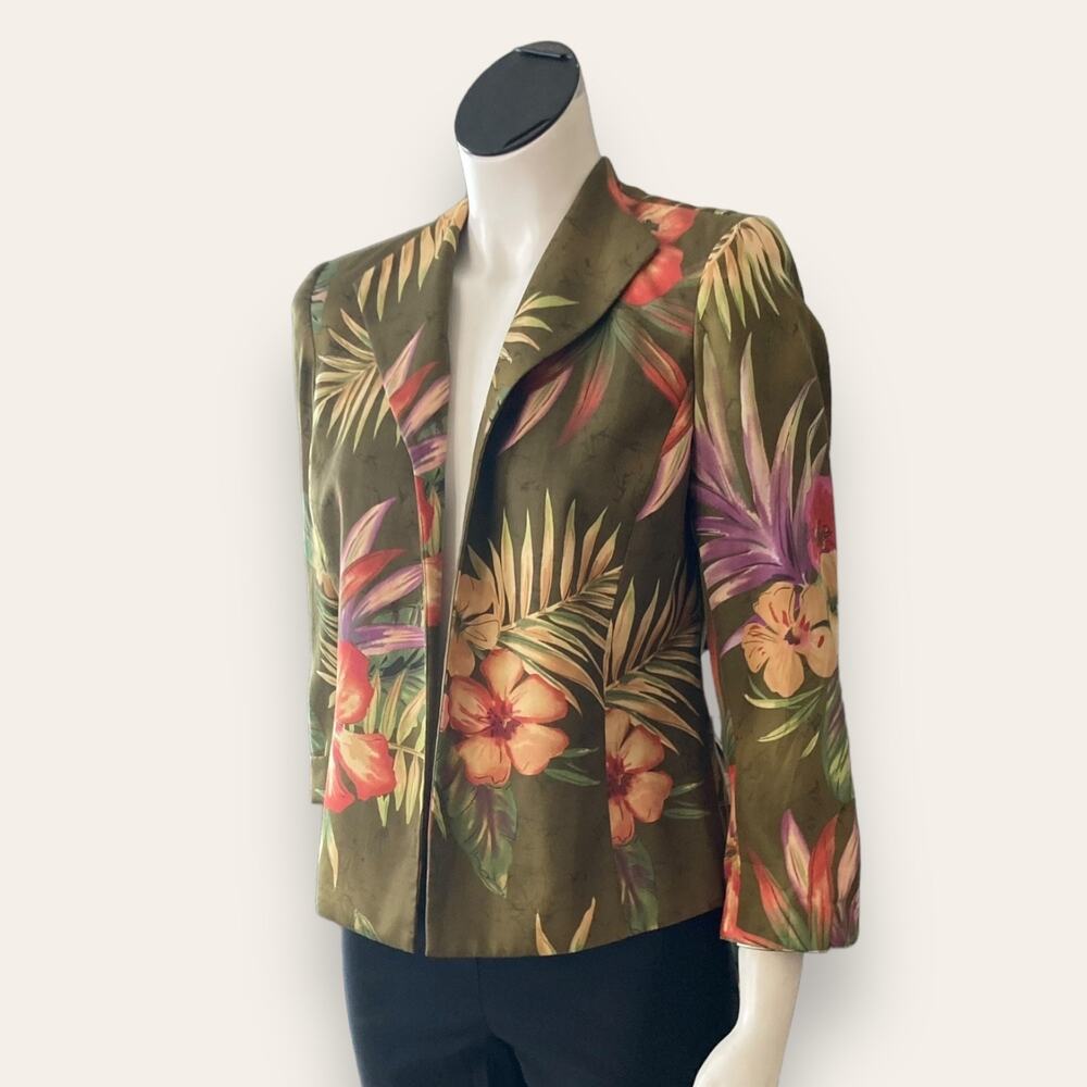 size 6 light overcoat with hibiscus flowers on green fabric
